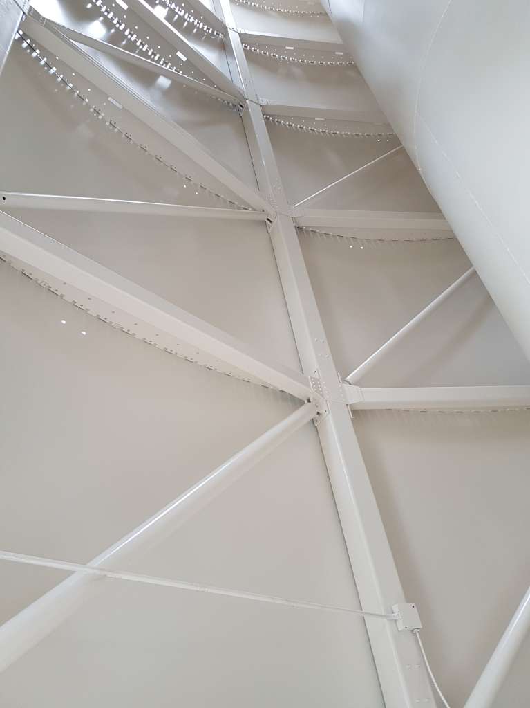 Inside of enclosure at Site #2 primed and ready for painting