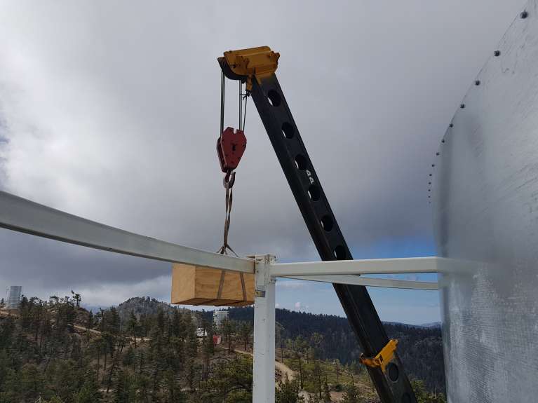 Scissors lift tables lifted into place